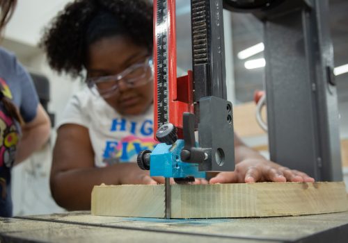 SkillSet video thumbnail with girl working on a project